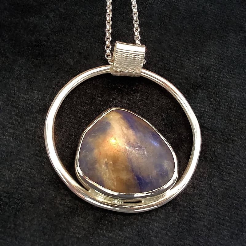 Blue stone in ring necklace