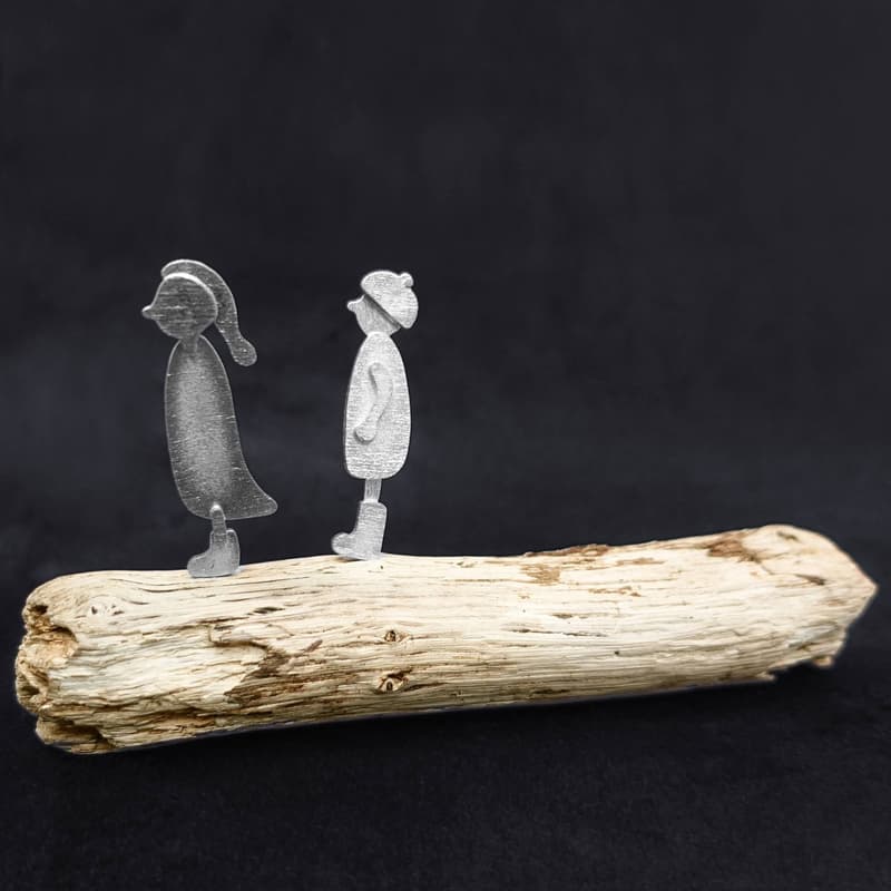 People on Driftwood - Couple